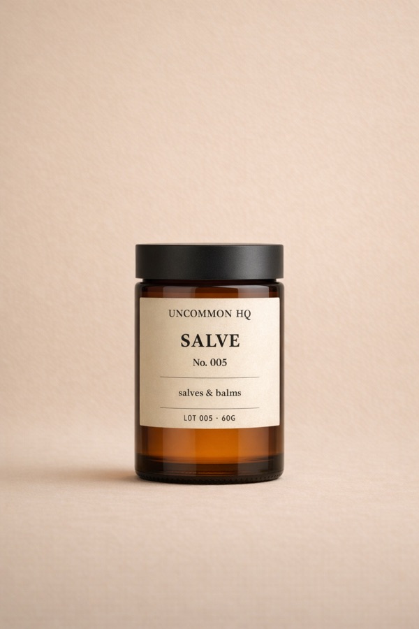 Studio photo of Uncommon HQ salve jar packaging